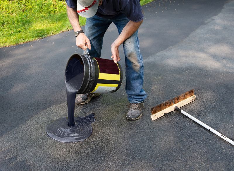 Sealing in Progress on a Driveway